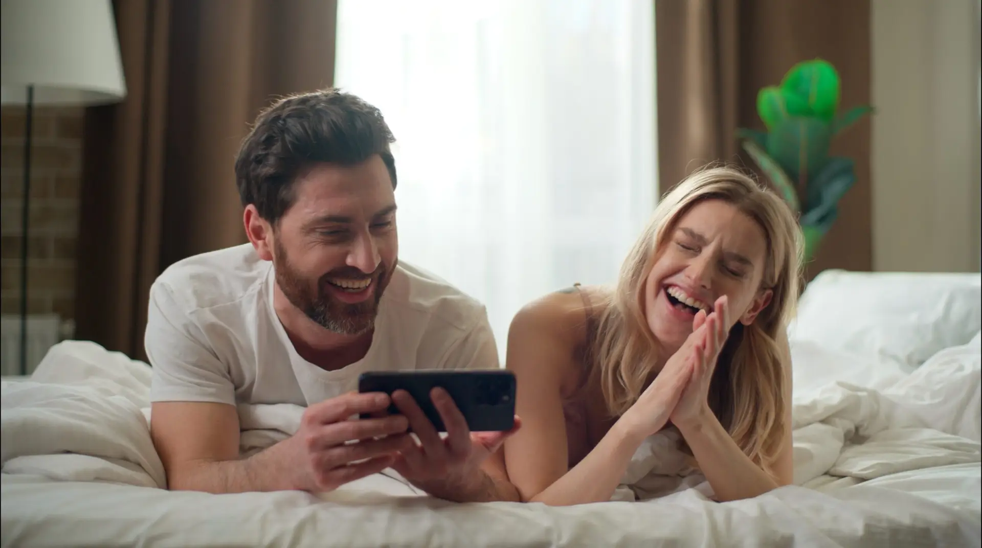couple laughing at a youtube trend