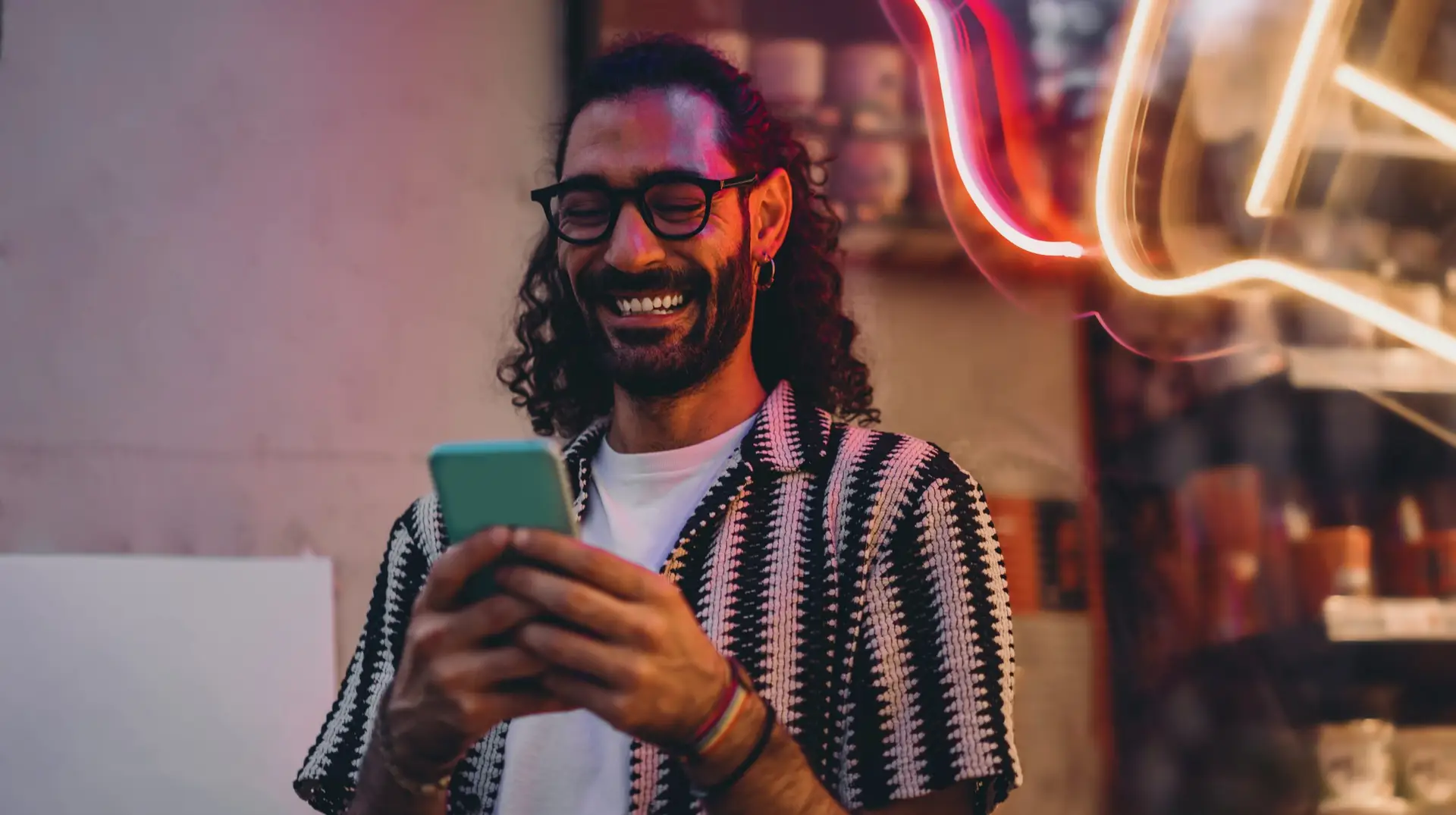 man looking for social media trends on his phone