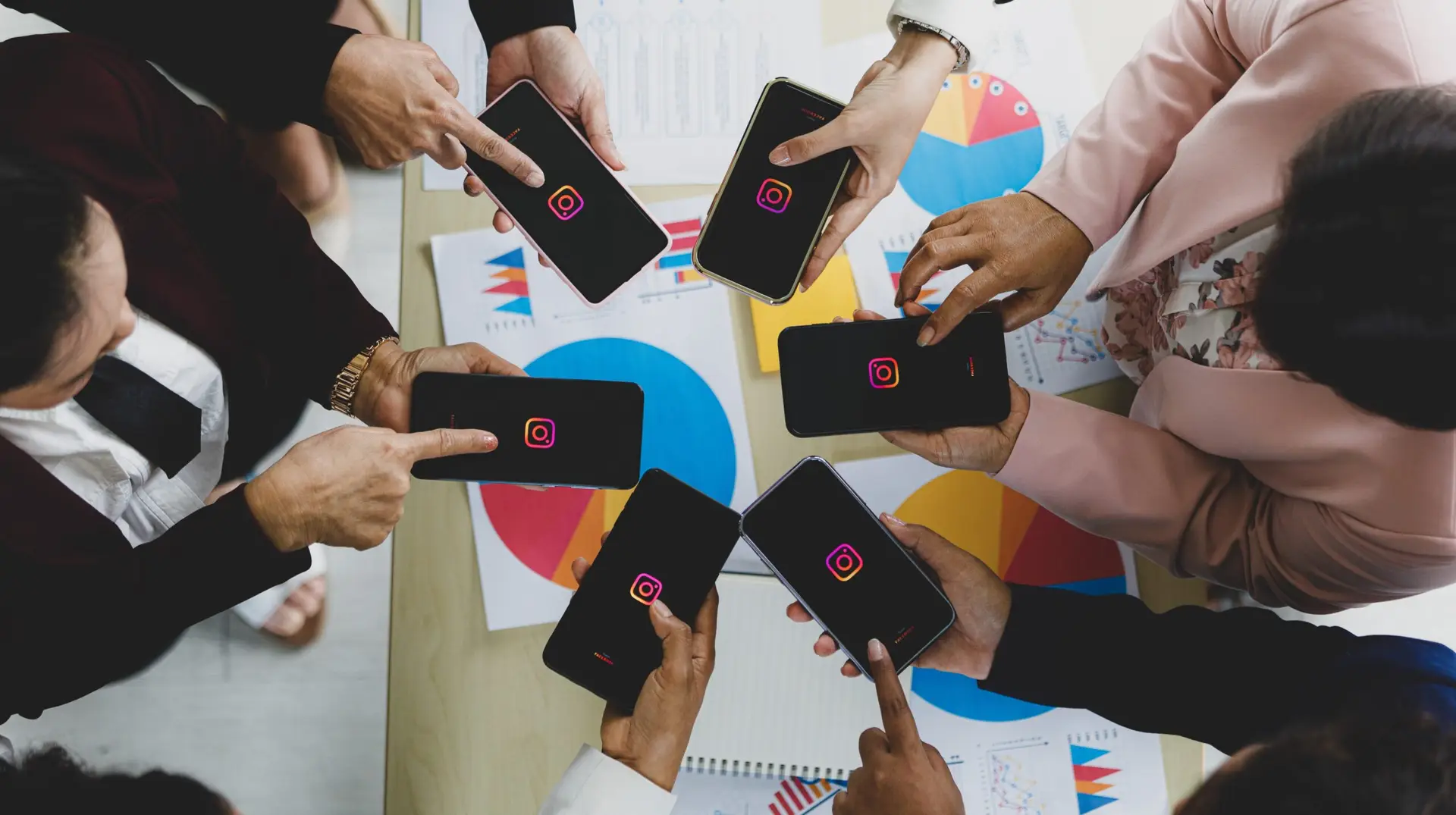 people in a circle with instagram on their phones