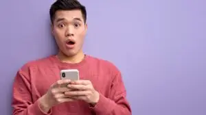 man reacting to a tiktok trend