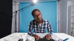 man being confused while watching tech news on his computer