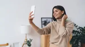 woman recording herself for trends
