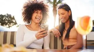 woman and her friend on their phones