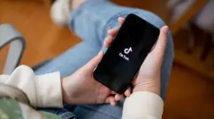 TikTok logo on a phone