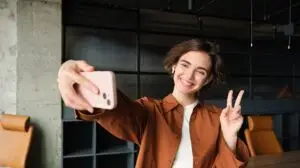 woman recording herself for a tiktok video