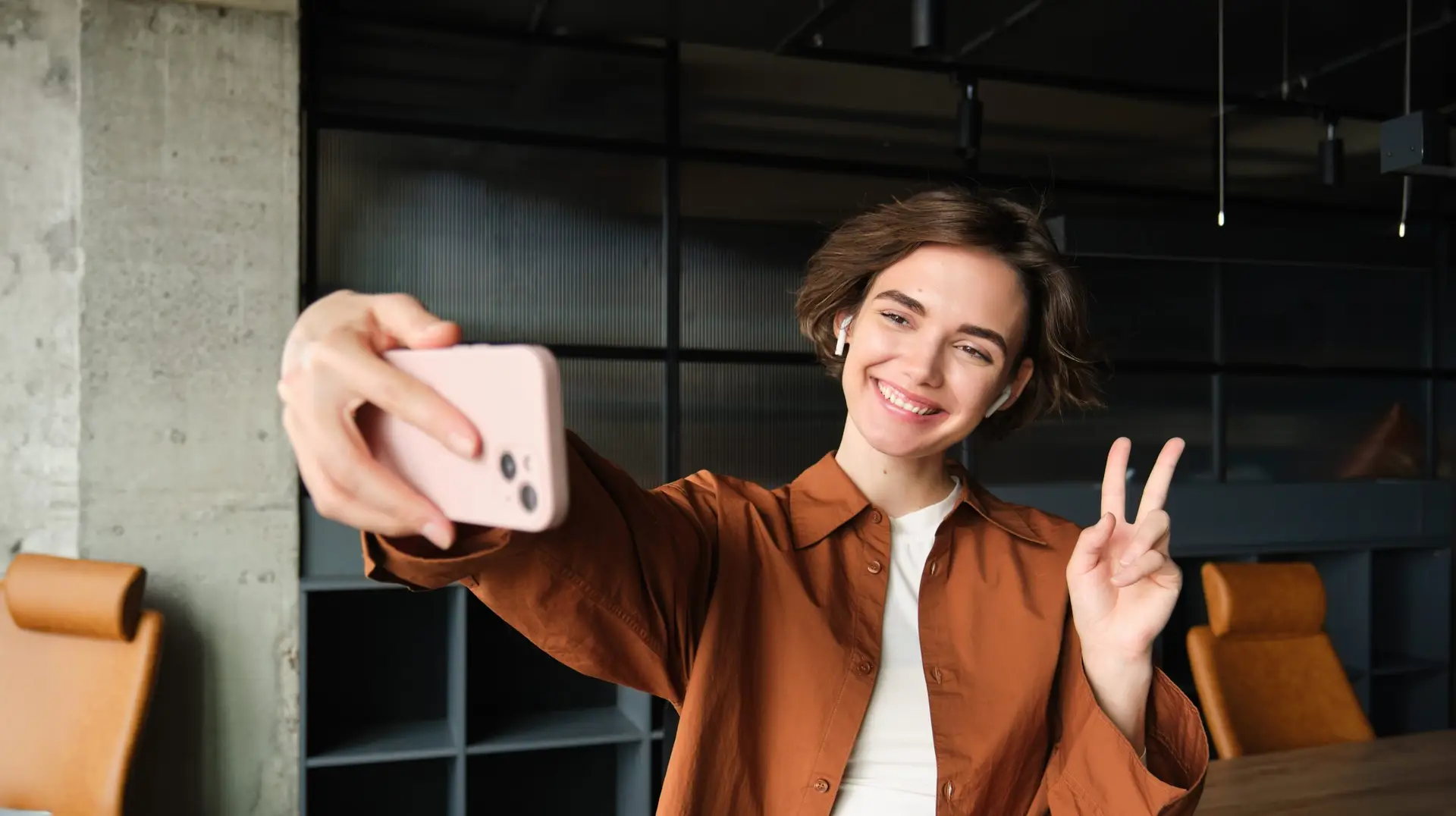 woman recording herself for a tiktok video