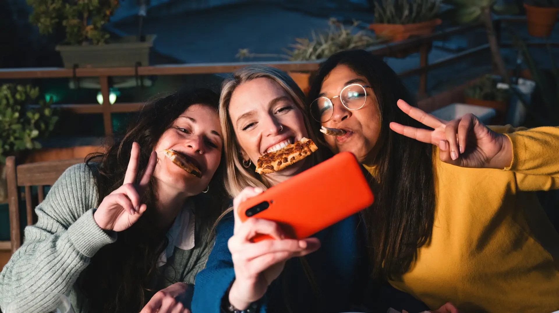 group of woman recording for a tiktok video