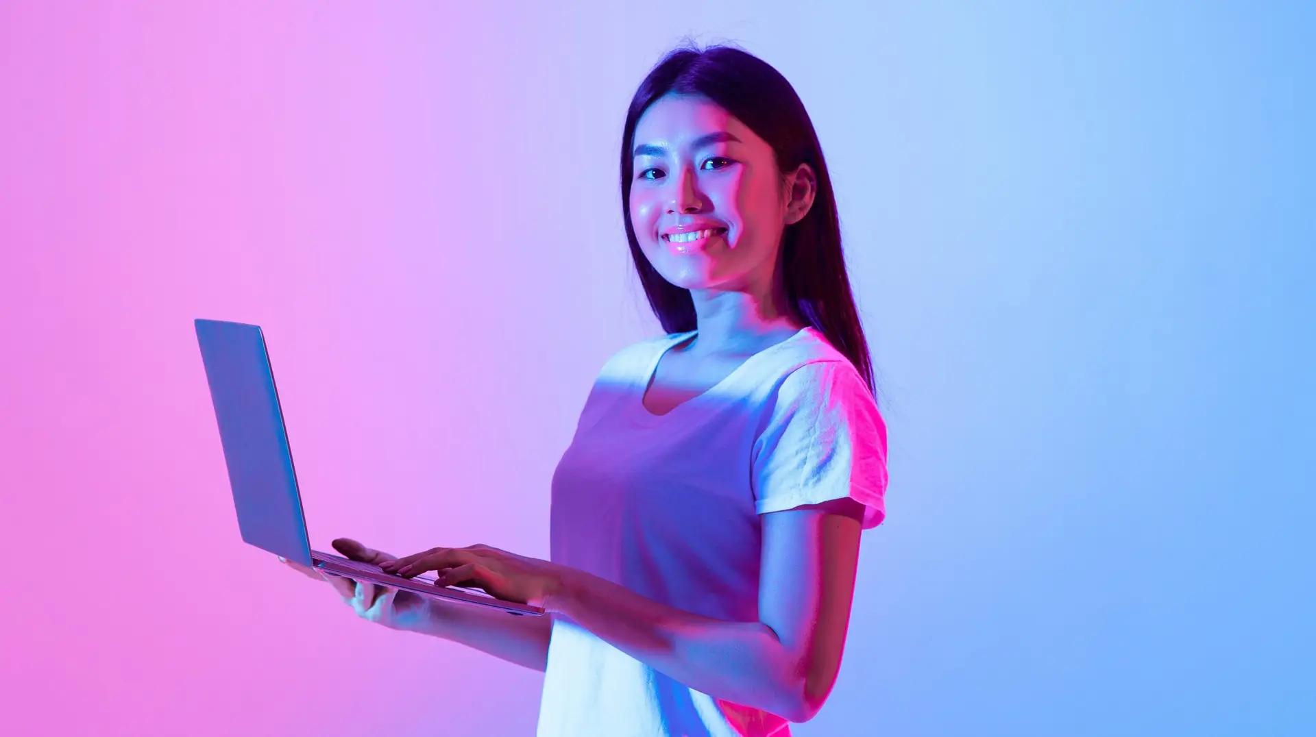 woman with a laptop thinking about social media trends