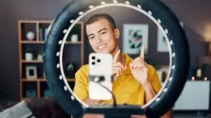 man recording himself doing a tiktok trend