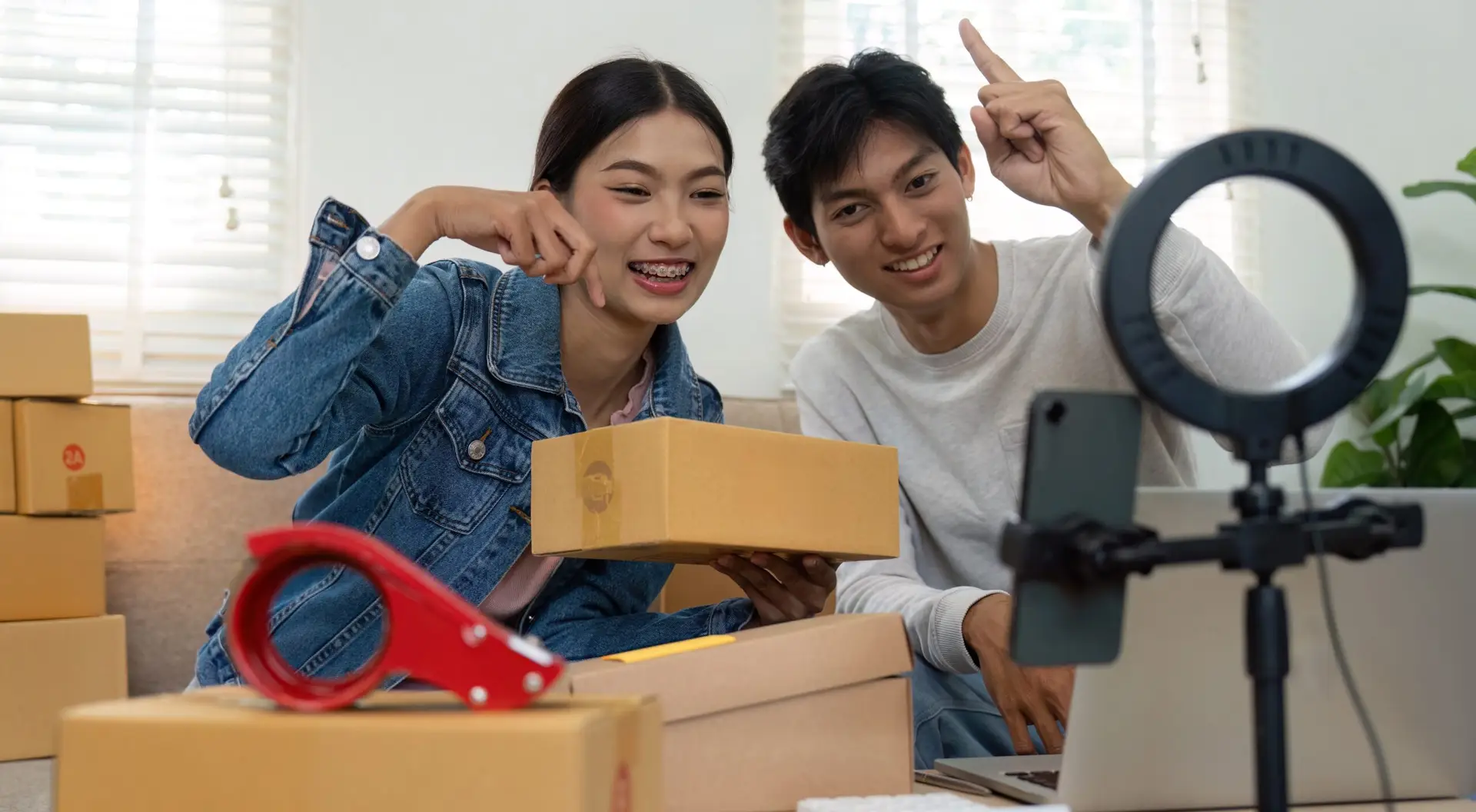 woman and a guy recording a video