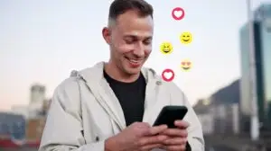 man on his phone researching social media trends