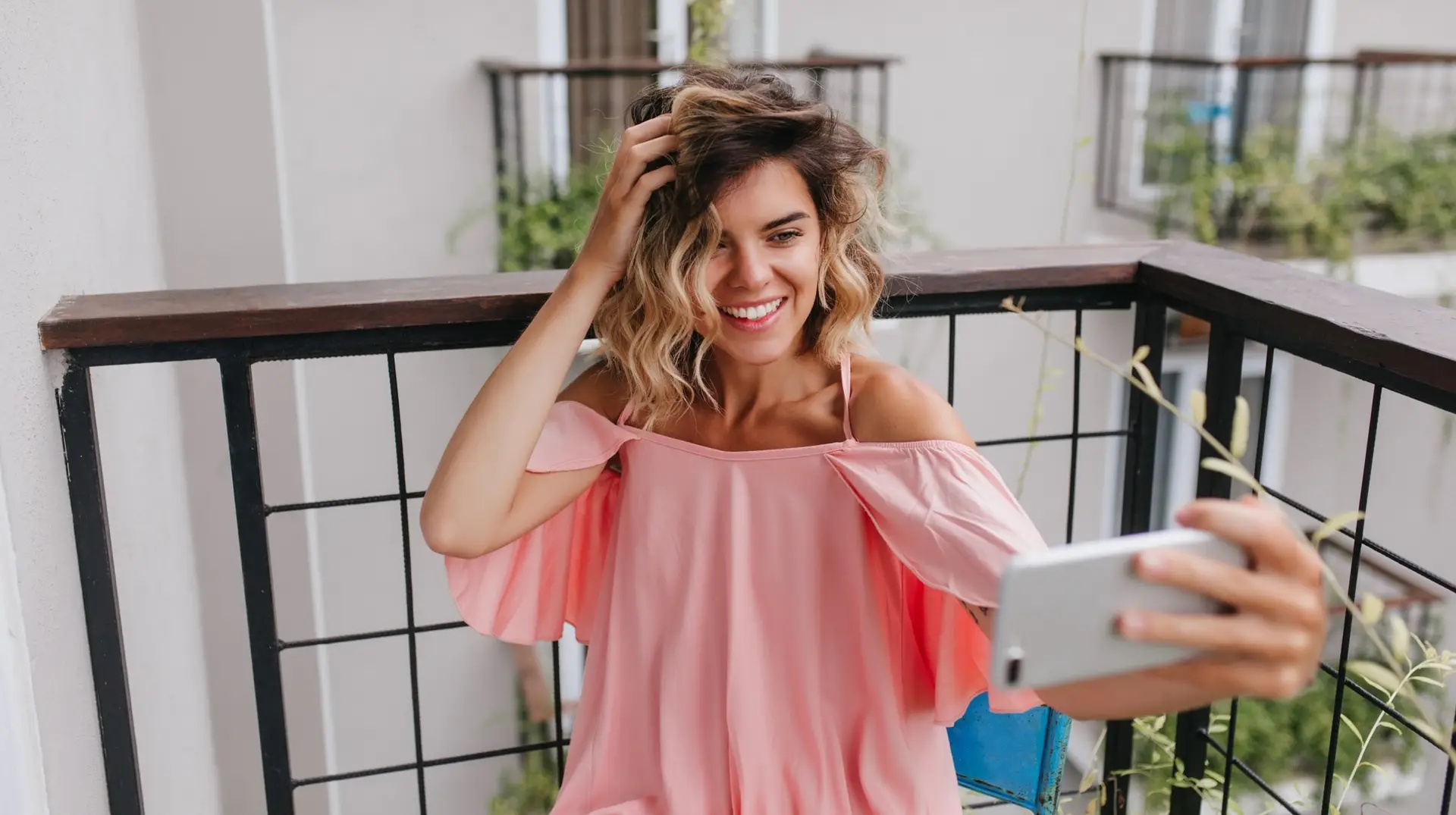 Woman recording an 'unfiltered day in the life' tikok video to grow her personal brand