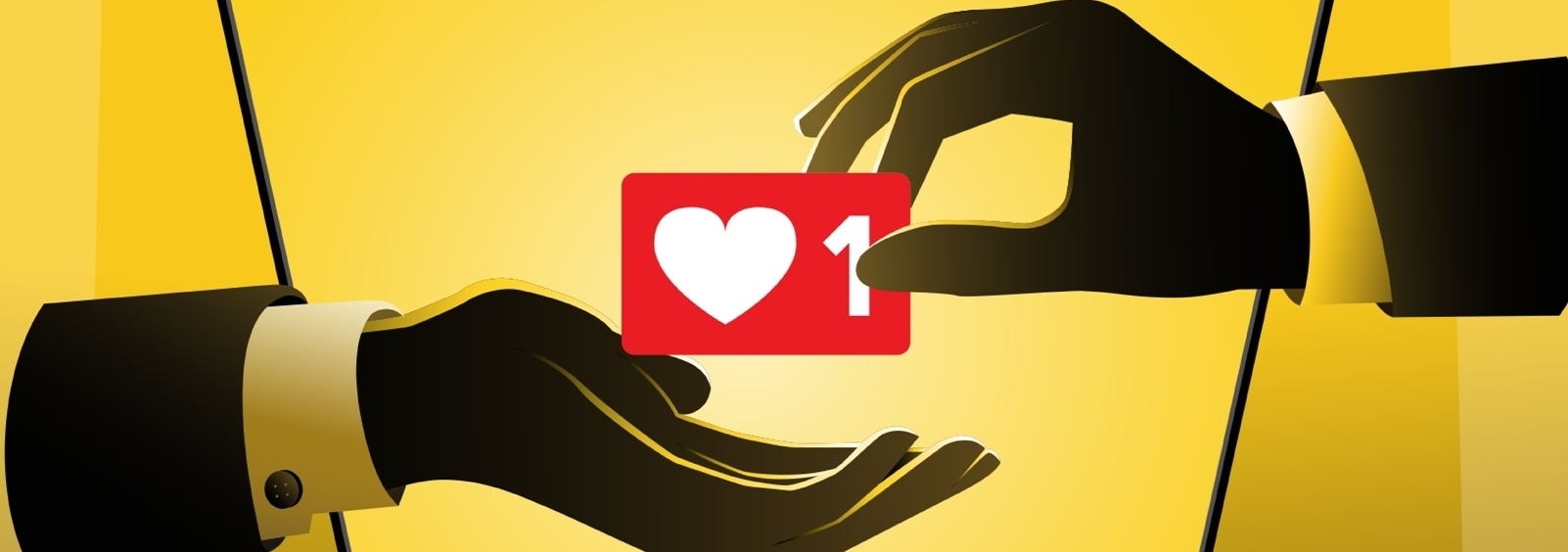 two hands passing a heart to eachother