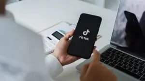 woman watching tiktok on her phone