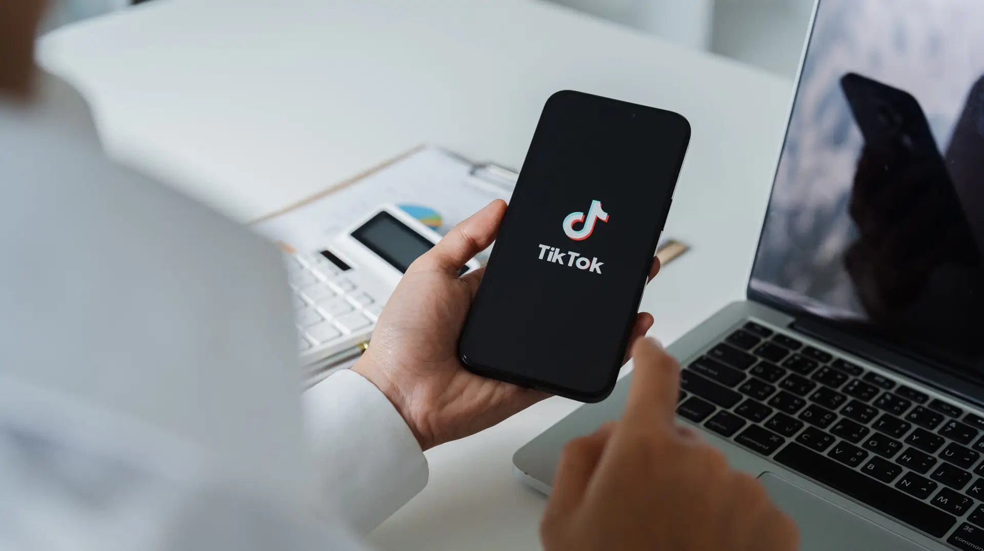 woman watching tiktok on her phone