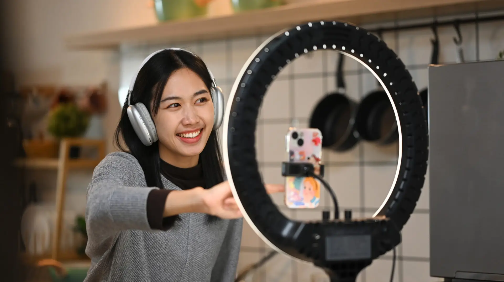 woman recording herself for a trend