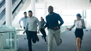 employees running in an office