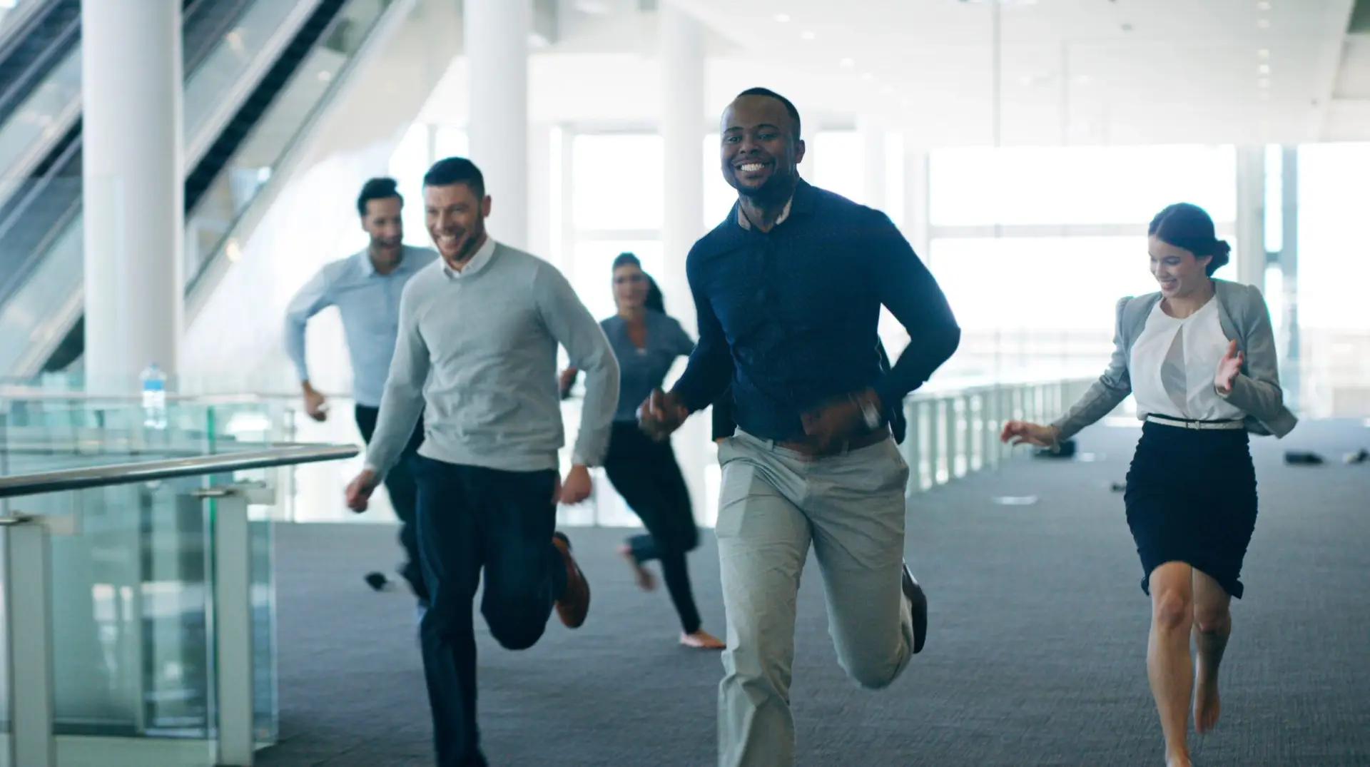 employees running in an office