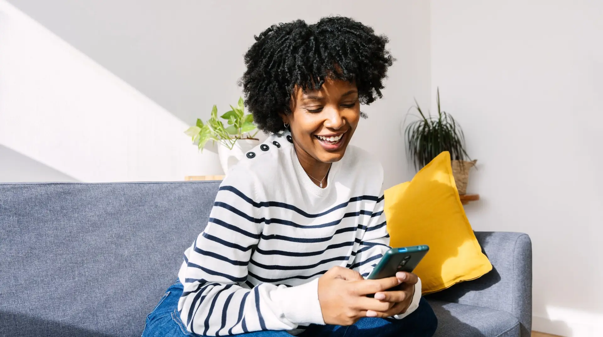 woman on her phone scrolling on social media trends
