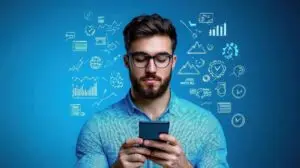 A digital marketer checking performance stats on his phone